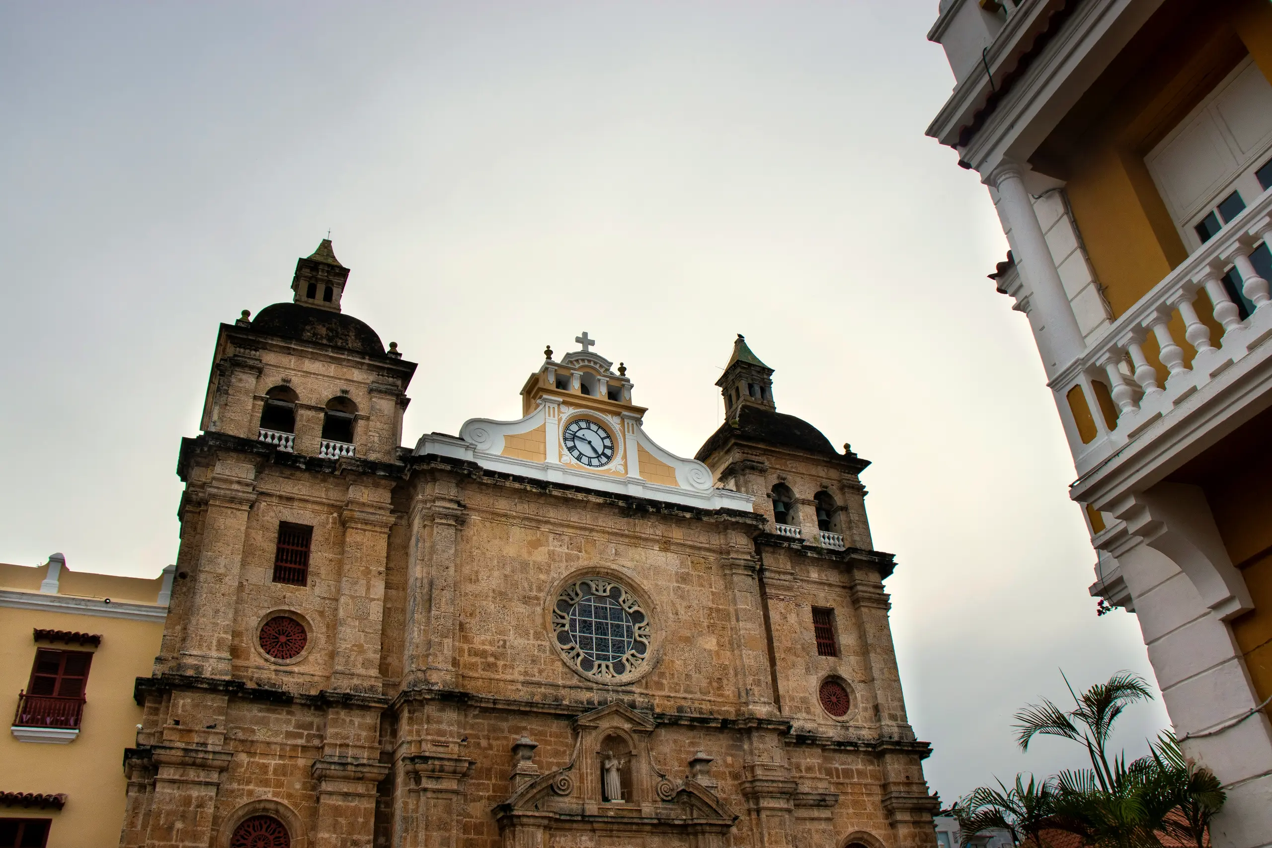 Colonial stone church facade seen from below