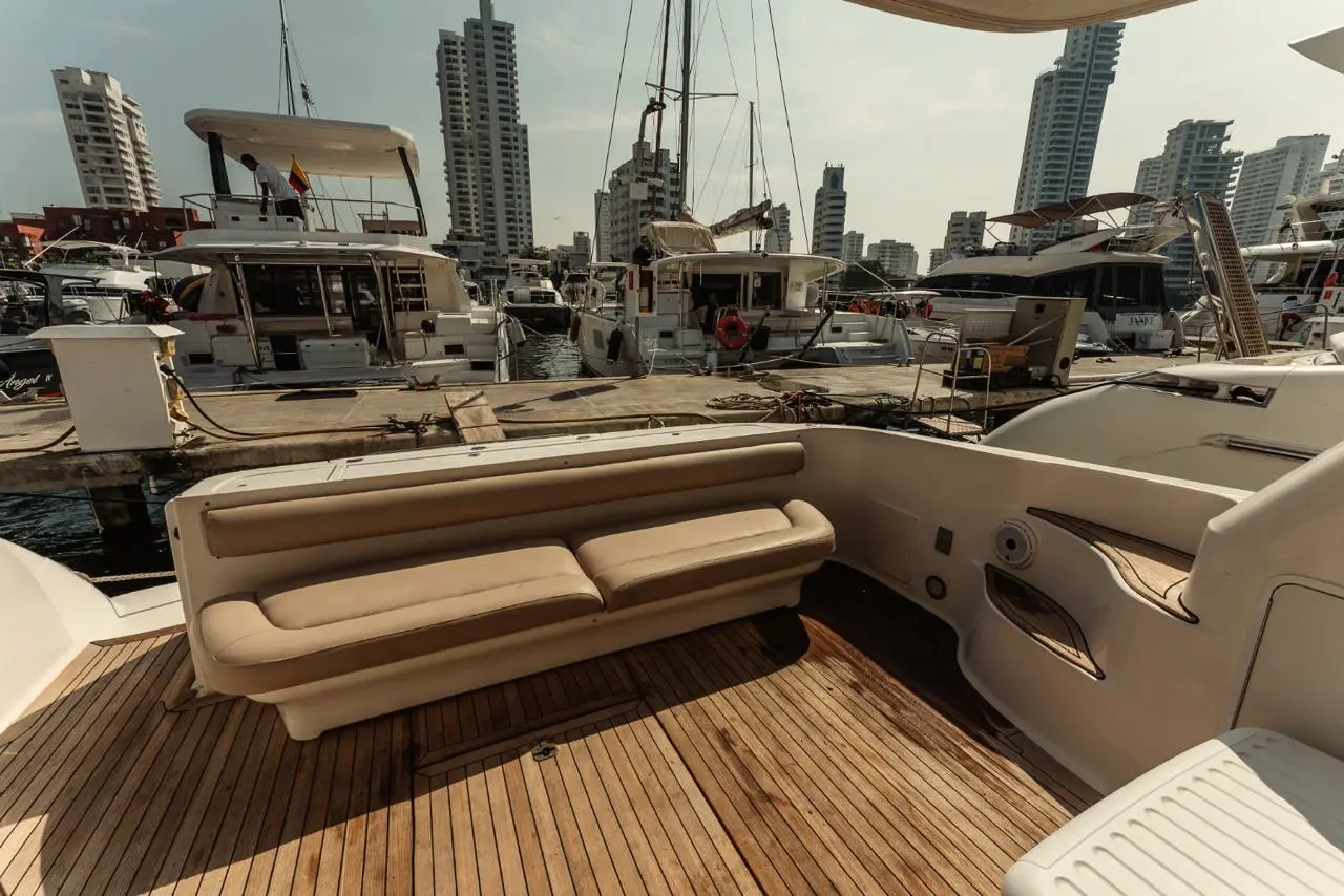 Yacht aft deck with a sofa and teak flooring
