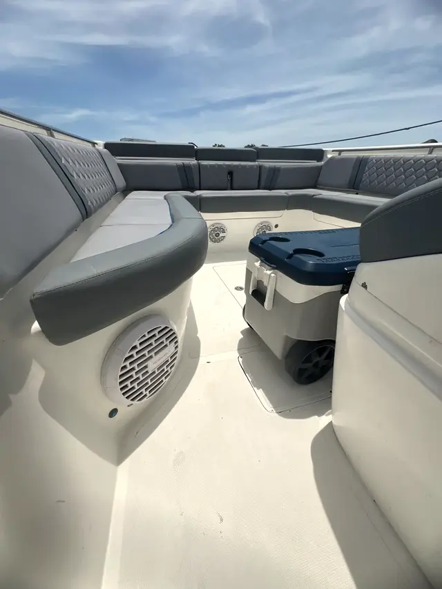Bow with gray seating and a view of the water